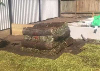 Colorbond fence with lattice topper and turf installation