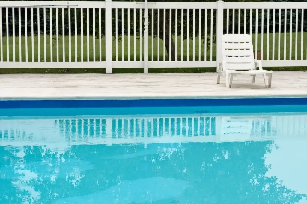 white pool fence